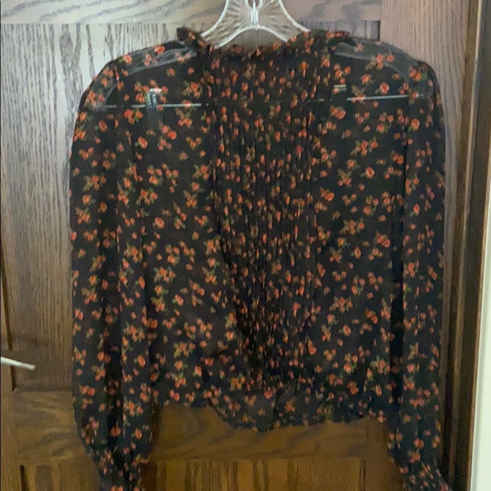 Cute mock turtle neck sheer tie in the back blouse